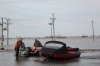 Курганские спасатели эвакуировали на лодке настоятеля храма в Смолино