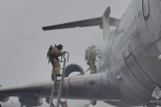 В иркутском аэропорту потушили загоревшийся самолет: кадры с места события