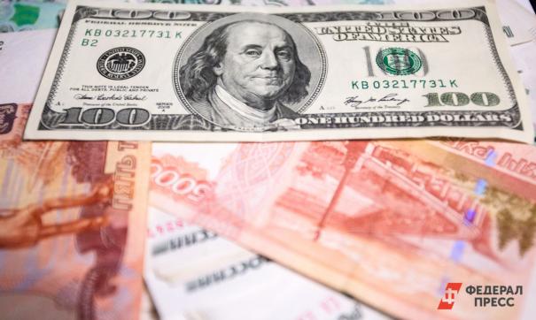 Романчук сообщил что доллар может вернуться к отметке 60 рублей