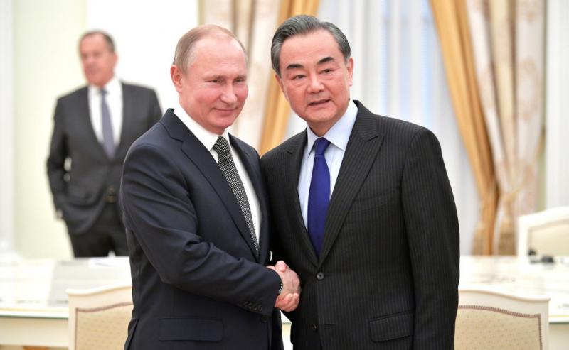 Путин и Ван И