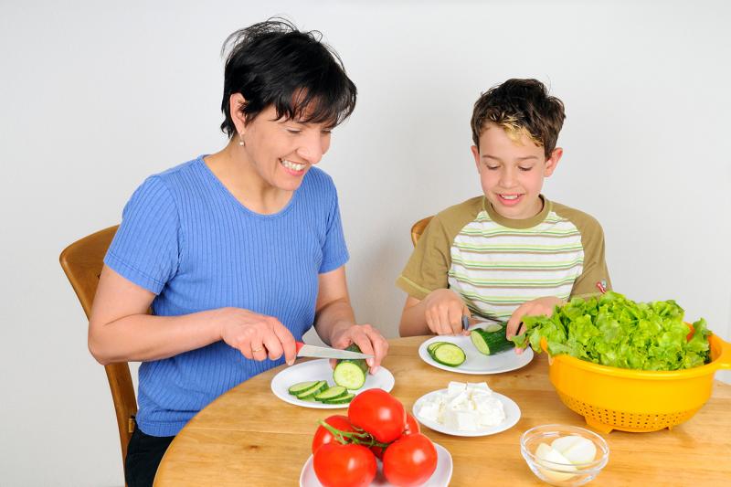 She is making the salad