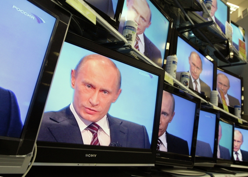 Президент России Владимир Путин в телевизорах